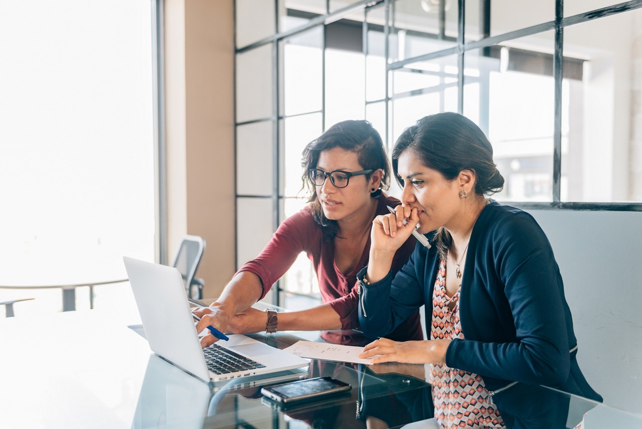 Mexican businesswoman meeting in office