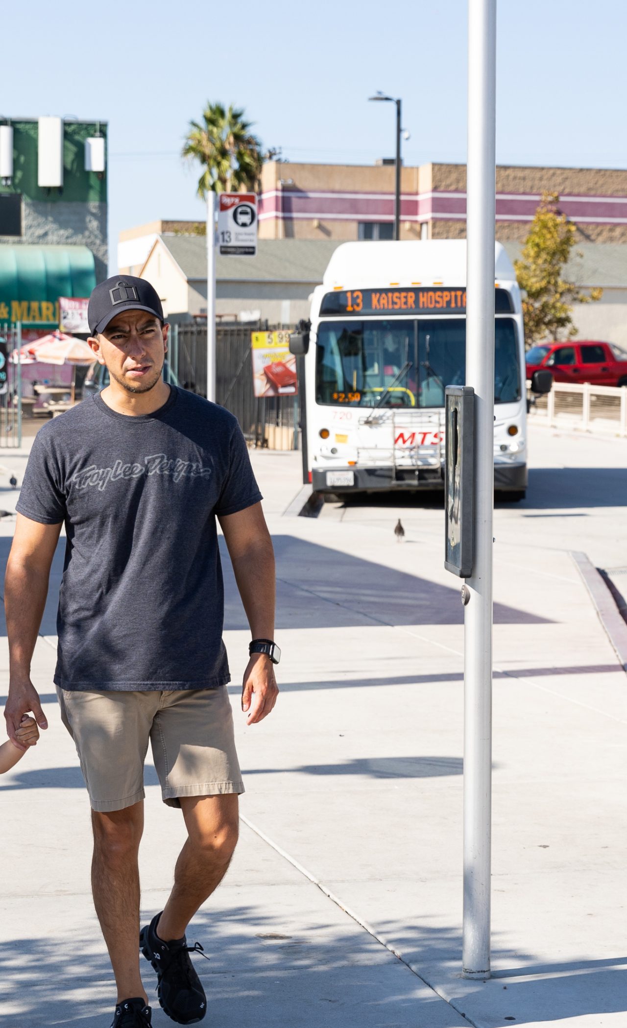 David Rodriguez takes his 2 year old son Oliver to the 24th Street Trolley and Transit Station in National City, California to look at the trolleys and buses pass by.