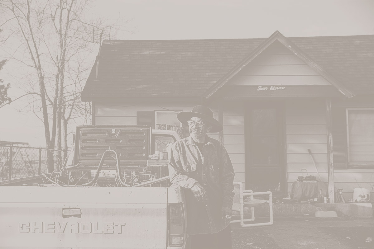 Mario Molina in front of the house he shares with his brother Cruz in Garden City, Kansas.  They inherited the house from their late parents.