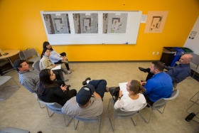 A group meets in a community center.