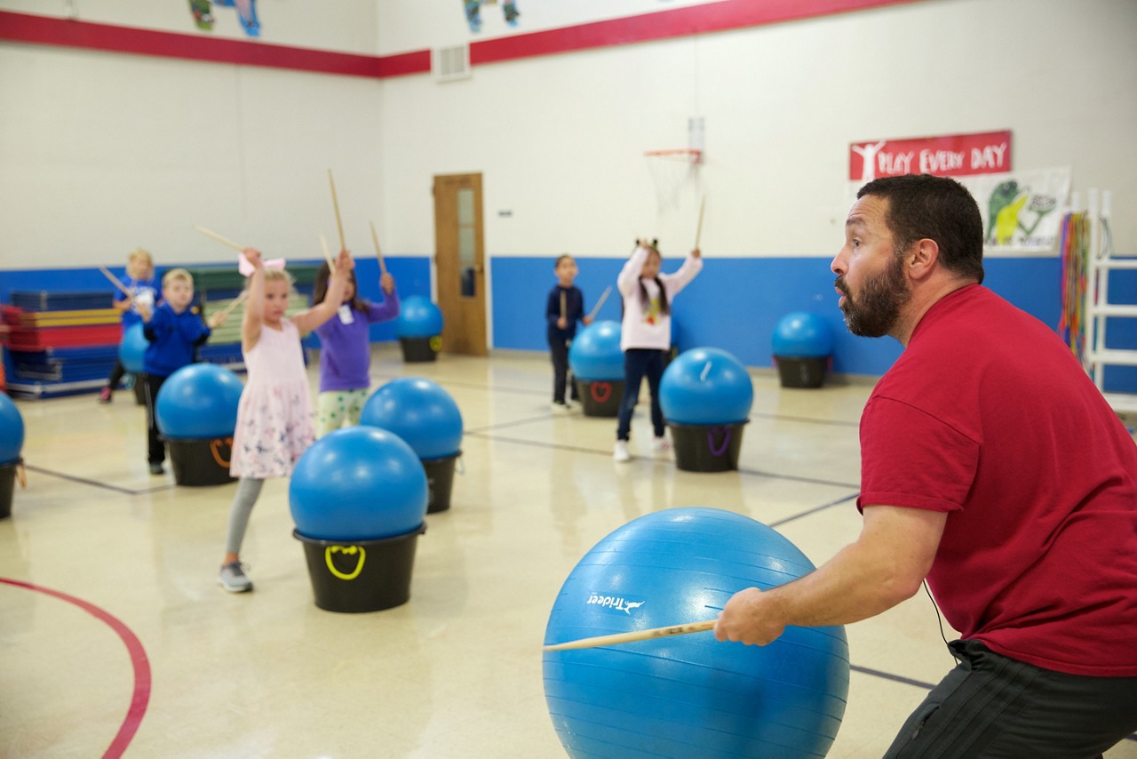 SITKA, ALASKA - SEPTEMBER 2019: Drumming class in the Baranof Elementary School. SITKA, ALASKA - SEPTEMBER 2019: Drumming class in the Baranof Elementary School.