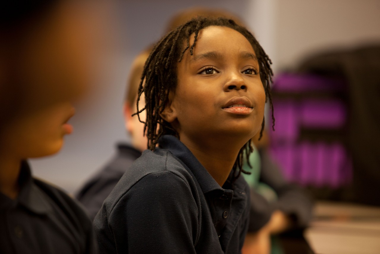 At the Northside Achievement Zone, where families and children move through a “cradle to career” pipeline so that high-risk youth graduate from high school ready for college. Here, a student participates in an after-school class. Minneapolis is one of six winners of the inaugural RWJF Roadmaps to Health Prize.