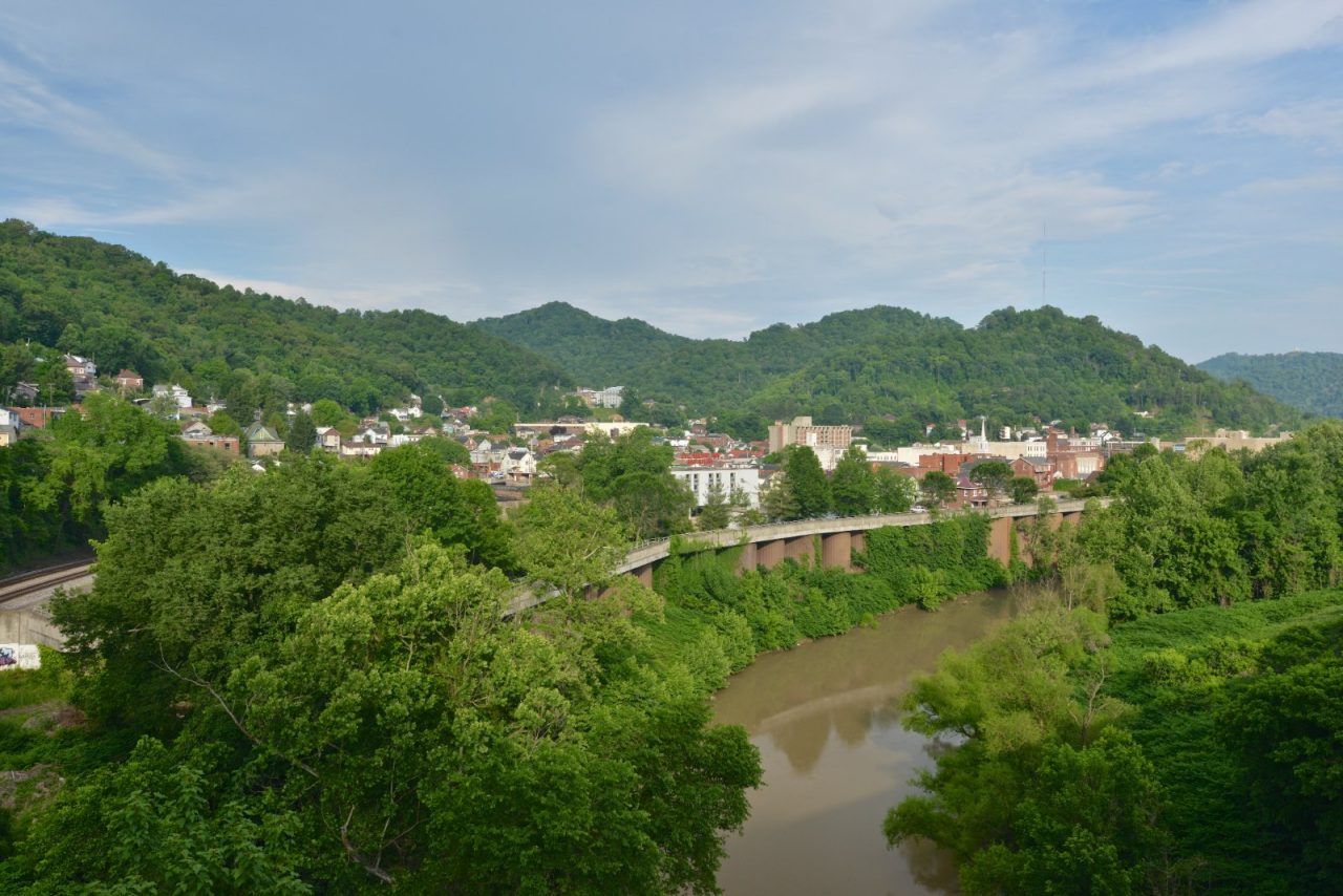 Panoramic view of a riverside town.