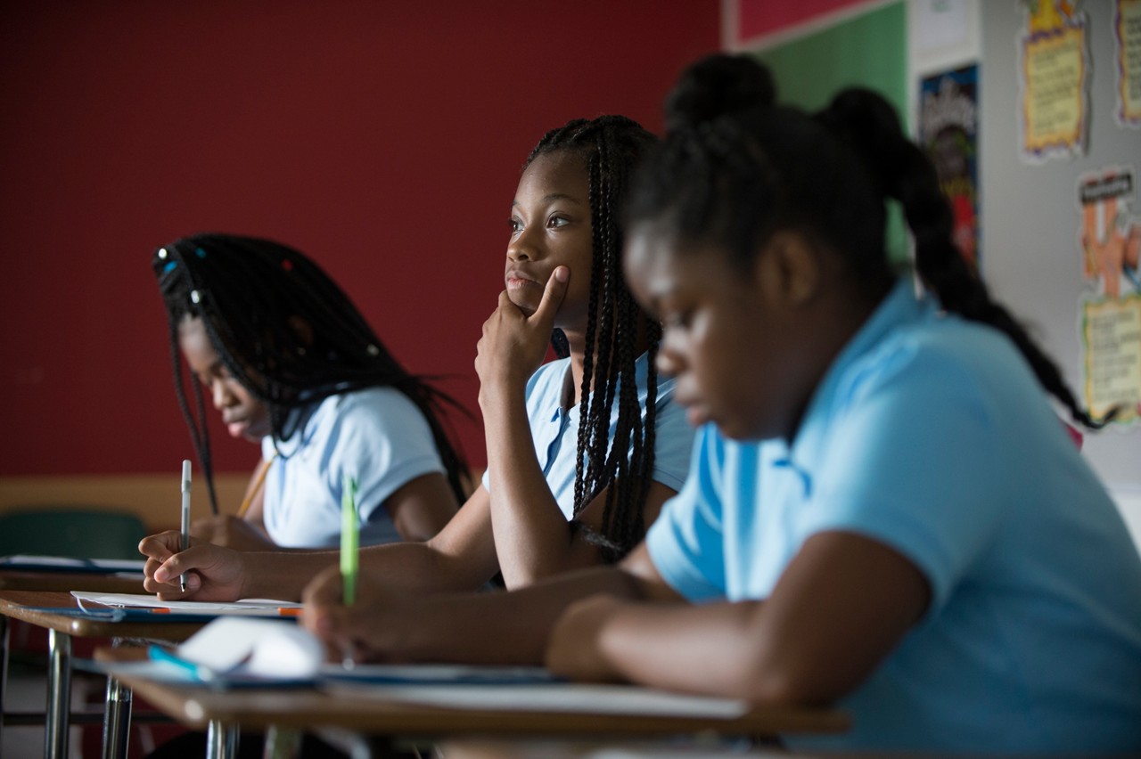 Students writing during class.