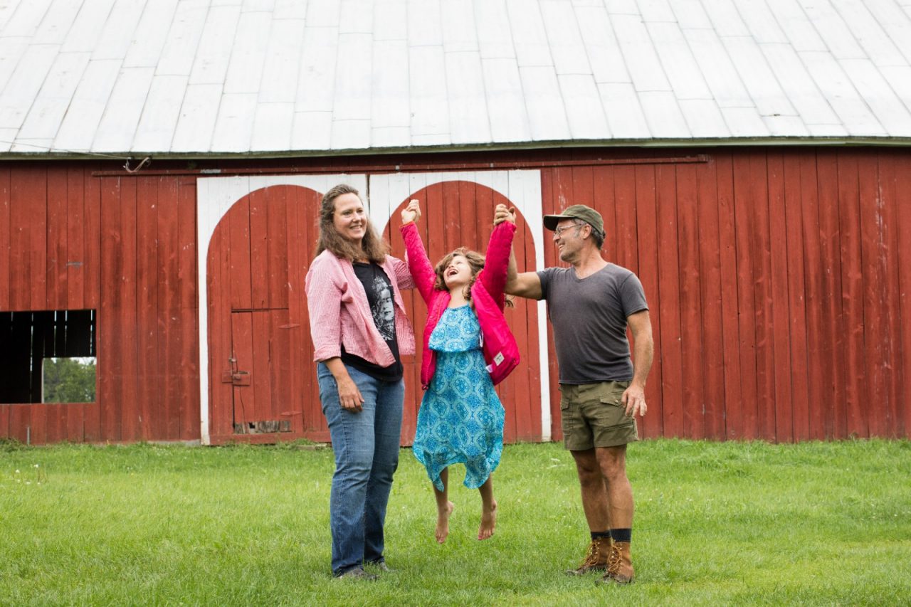 Claire Thompson and her husband Mario Micheli, shown here with their daughter Nina, started Clario Farms.