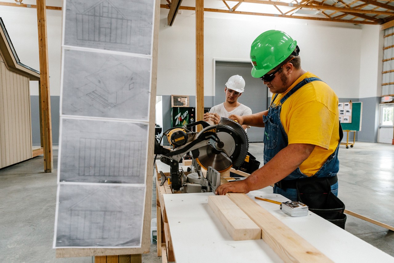 Students Christian Jackson (left) and Kiefer Endicott work at the Regional Technology Center.