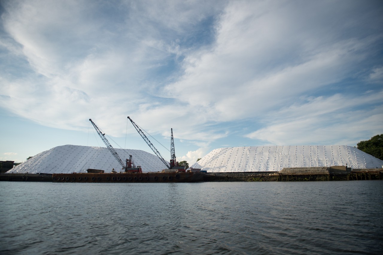 Rock salt piles line Chelsea Creek.