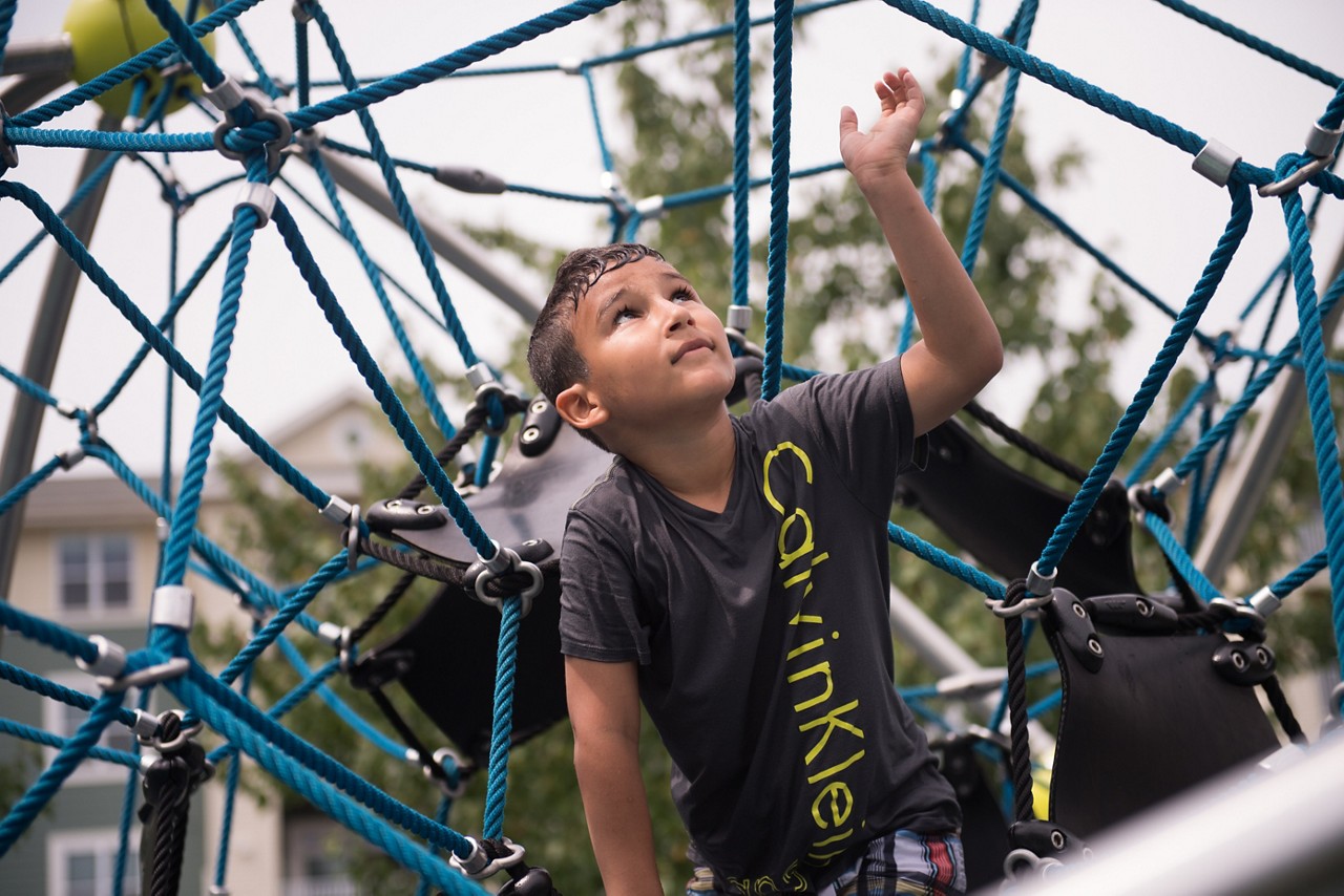 Miguel Ferreira plays in Creekside Common Park.