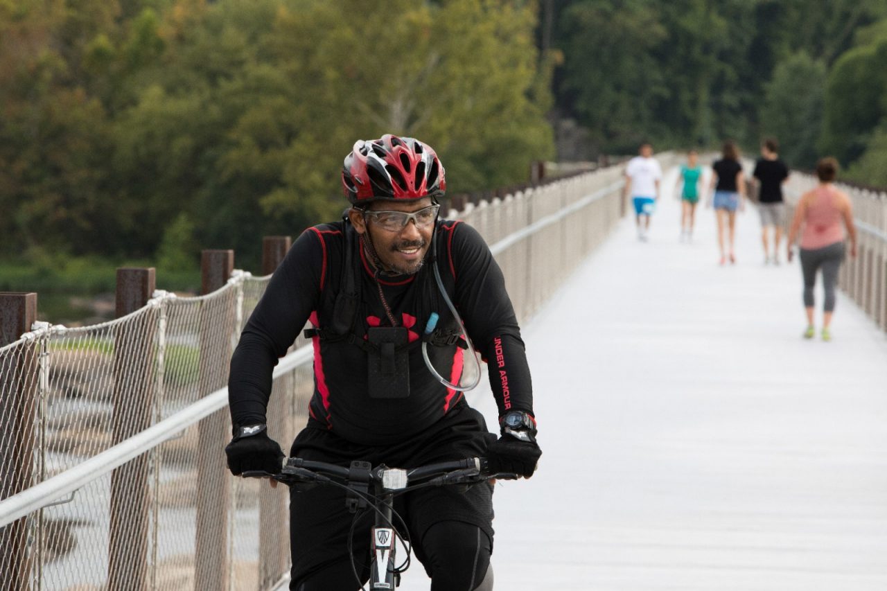 Marcellus Carter cycles across the Potterfield Bridge.