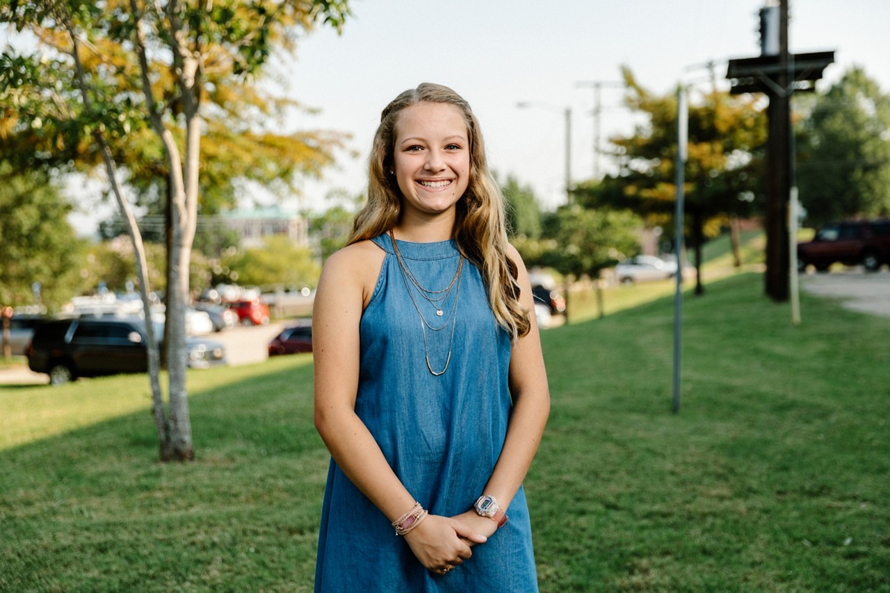 Vicksburg, MS - Aug 3, 2017 - Marin Sherwin, a student in the Vicksburg School District, stands outside the convention center before the convocation event begins.