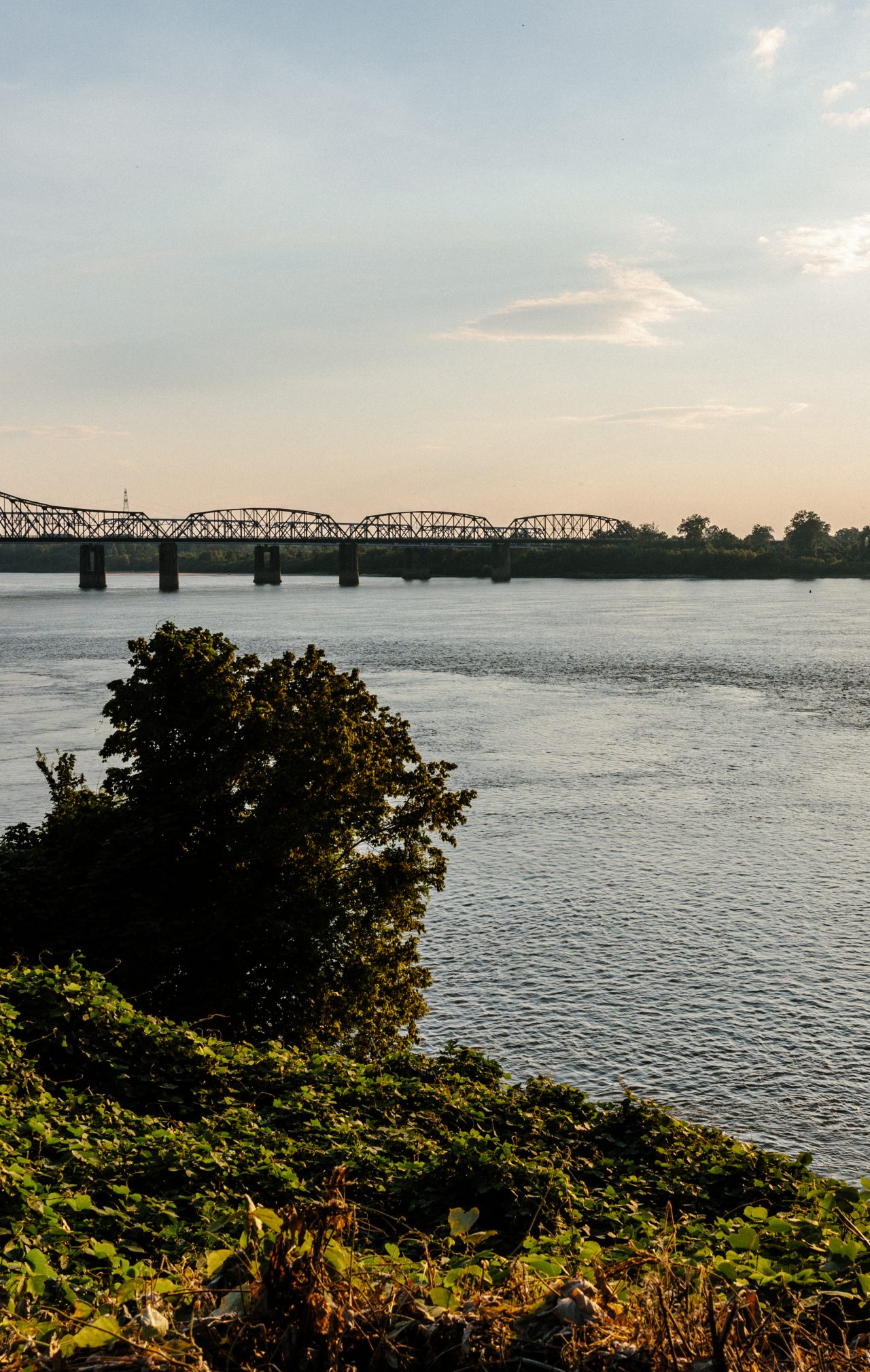 The sun setting over the Mississippi River. 