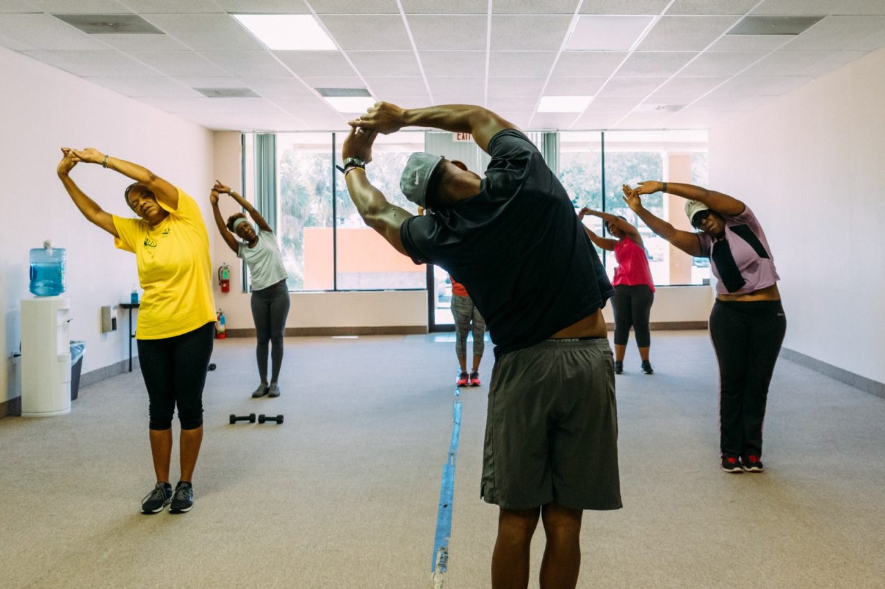 Damien Prieston leads an exercise class at the Eatonville Commerce Center
