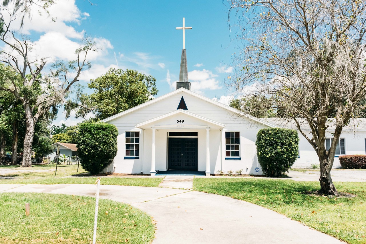 Church adorned with a cross.