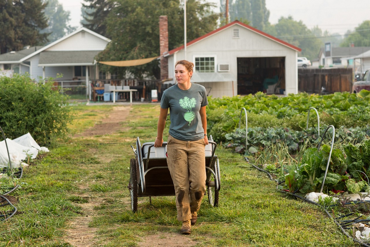 A woman working her farm.