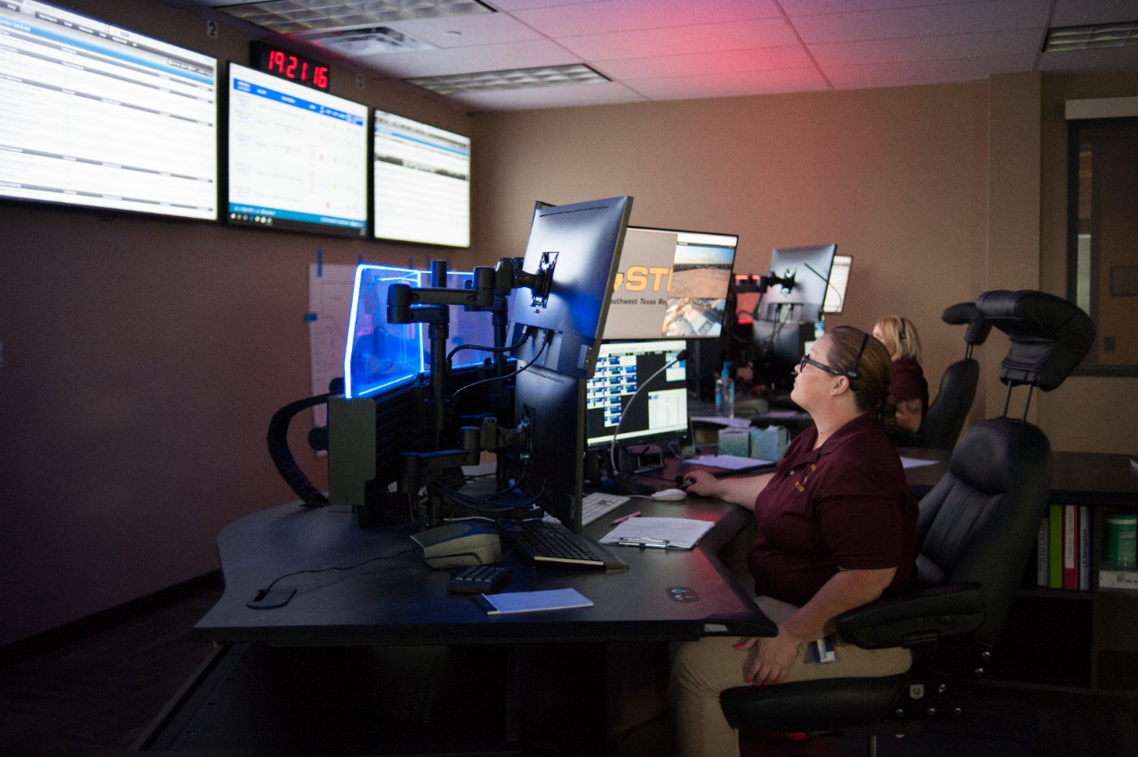 Communications Specialist Jessica Jackson monitors 9-1-1 calls for mental health emergencies.
