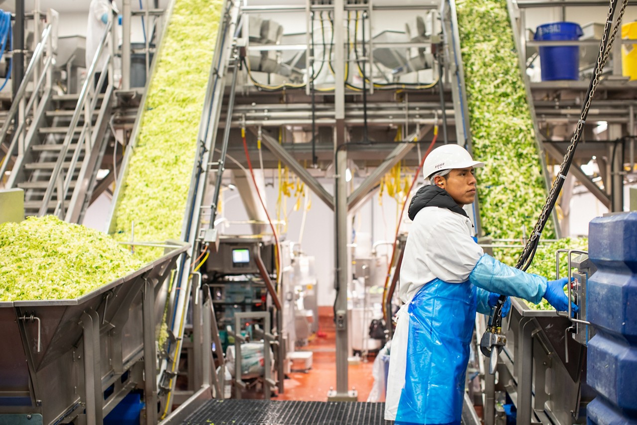RWJF Culture of Health Prize 2019. Gonzales, CA.  Armando Martinez works the line at Taylor Farms.  The community of Gonzales is investing in renewable energy projects — such as two wind turbines and solar panels for city buildings — while at the same time using energy-cost savings to attract new businesses. Attracted by lower energy costs, Taylor Farms  has opened a food processing center in Gonzales.
