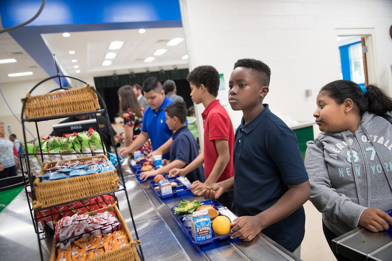 Students waiting in line to get lunch in at Tanglewood Middle School.