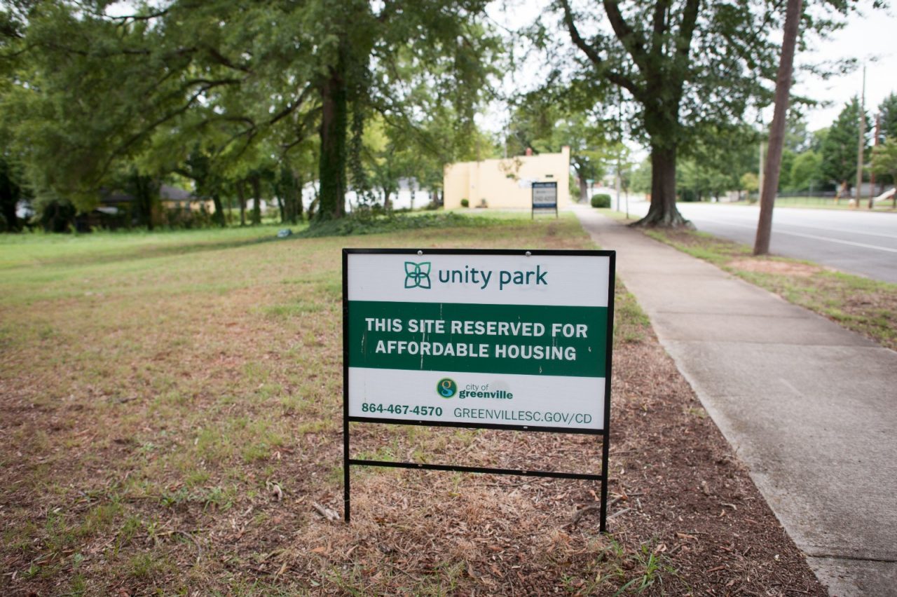 A sign marks a plot of land near the Unity Park site that the City of Greenville will develop into affordable housing. Property values around the park, which has just begun construction, have increased since the announcement of the project, creating fears that long-time residents will be unable to remain in the area.