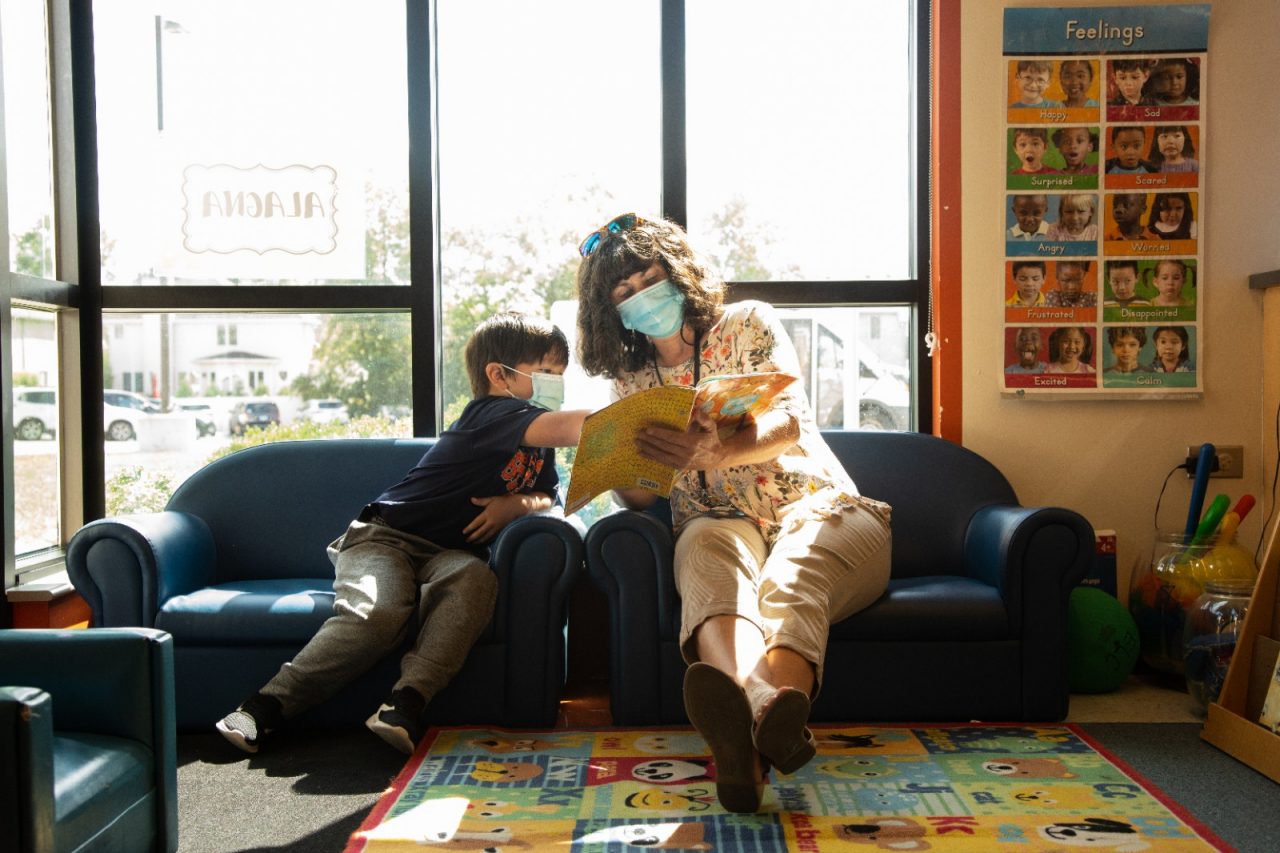 Teacher reads with a student at the Addison Early Learning Center in Addison, IL.
