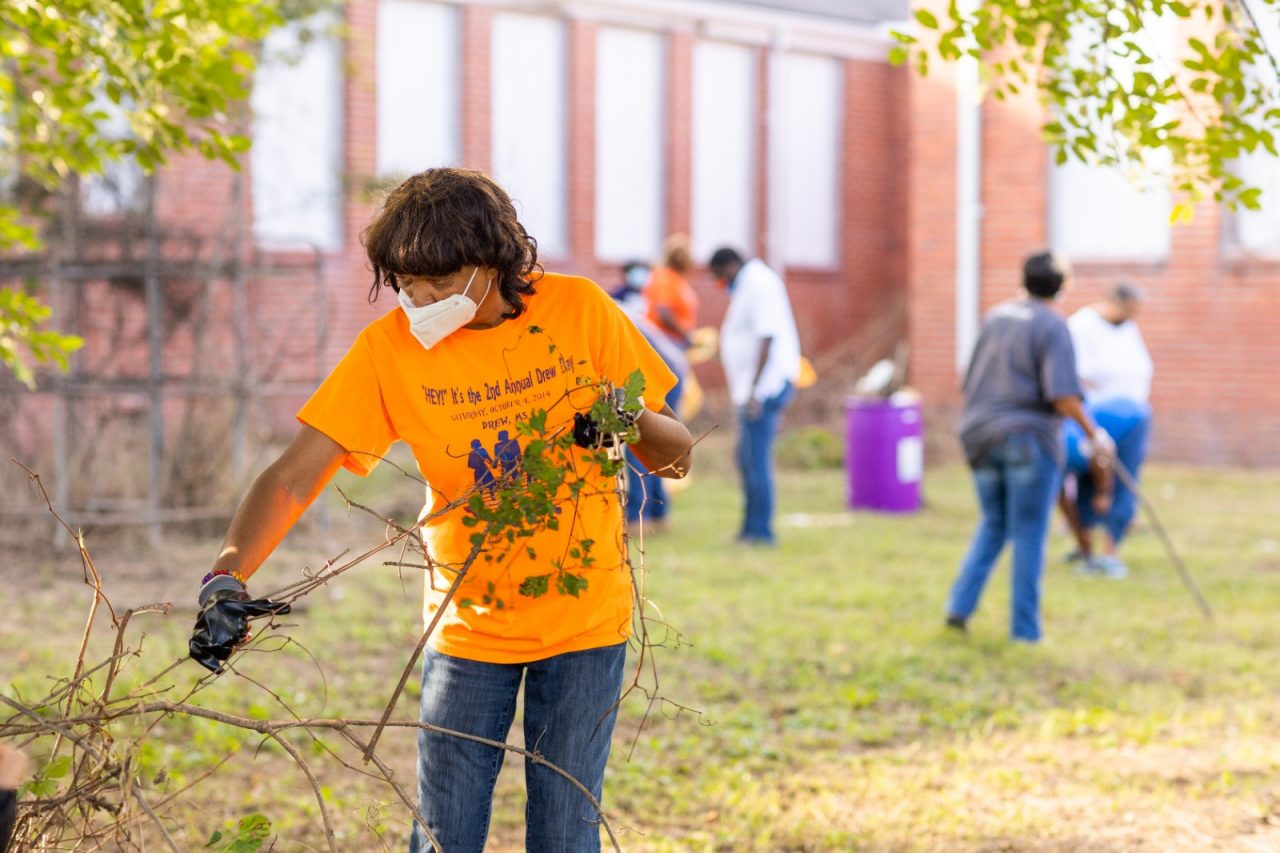 Gloria Dickerson, CEO of We2gether Creating Change, brings together a team of volunteers to clean up the abandoned grounds of the Rosenwald School in Drew, Mississippi.