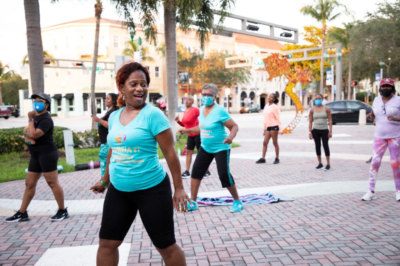 Say What! Enterprise is a movement program that addresses anxiety, depression and mindfulness.  Pictured here is Angela Williams (most forground), Cecelia Shade (left of frame - black top + short black shorts + cap) and Yvonne Odom (center right of frame with teal mask - teal shirt and black shorts).