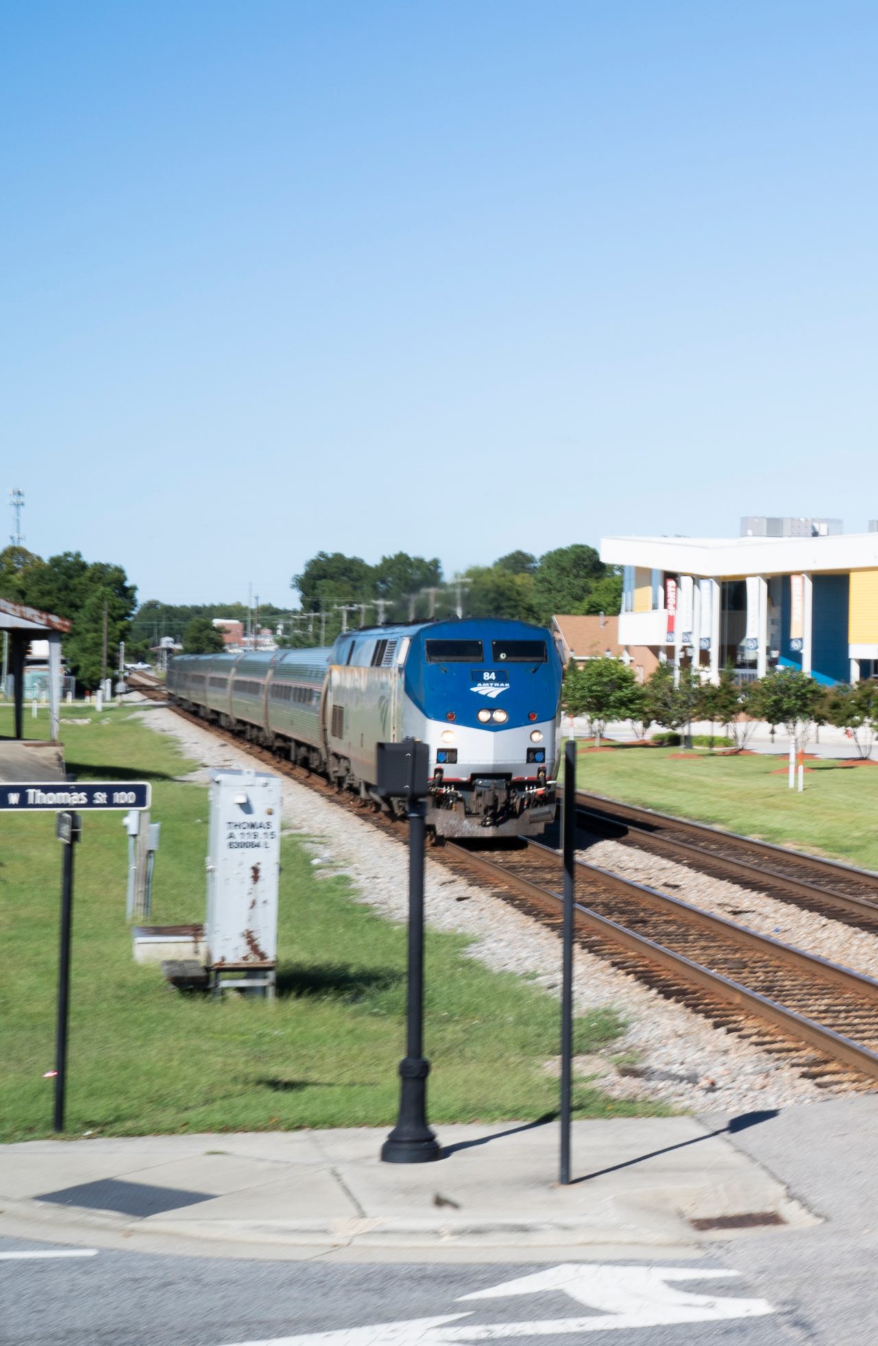 A train traveling through a small town.