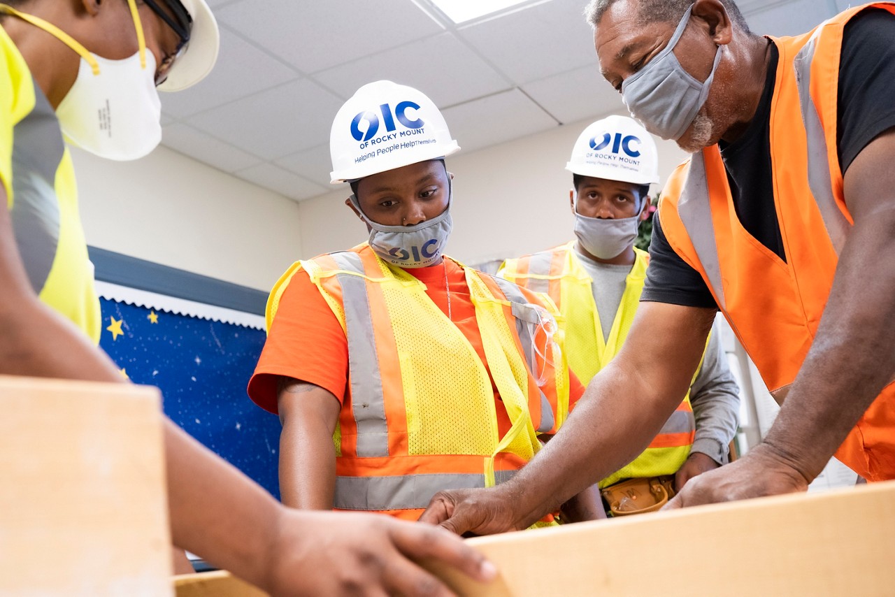 OIC of Rocky Mount holds a carpentry class to enable a new work force of young builders. Rocky Mount, NC. September 22, 2021 (Photo by Samantha Appleton)

In the face of historical challenges, the people of Rocky Mount, N.C., are embarking on a journey to address structural racism and racial equity as key drivers of health. This rural town of 54,000 is working to make the city’s power structure more inclusive, encourage collaboration between generations and racial groups, and address the root causes of racism. Residents are taking an expansive view of health and fostering connections around such critical issues as affordable housing, workforce development and wealth building, and access to healthy foods.