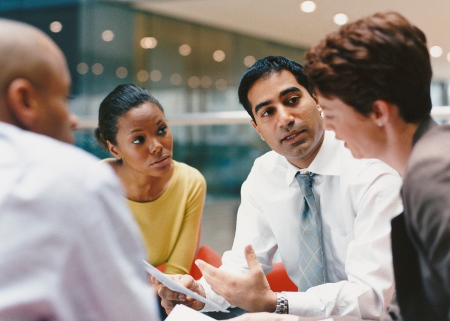 Business professionals at a meeting. 