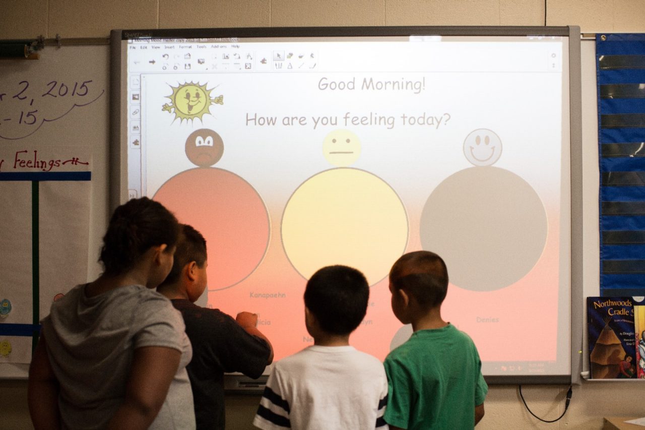 Menominee / Keshena September 2015.  Keshena Primary School. Miss Witt's 2nd Grade. Students touch interactive screen to communicate feelings.
