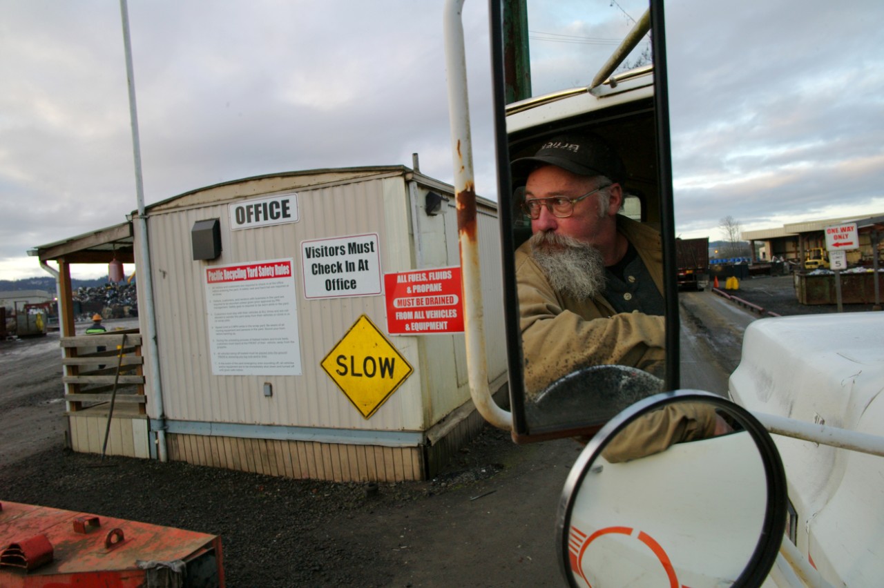 A truck driver at a recycling facility.