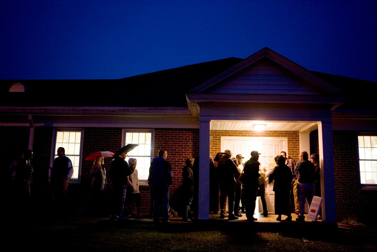 Members of the public line up at a polling station. Vote & Vax, a collaboration between the Robert Wood Johnson Foundation and SPARC, works with local public health providers to offer convenient flu vaccinations at polling places on election day across the country. Greensboro, NC. Faith Presbyterian Church. Vote & Vax