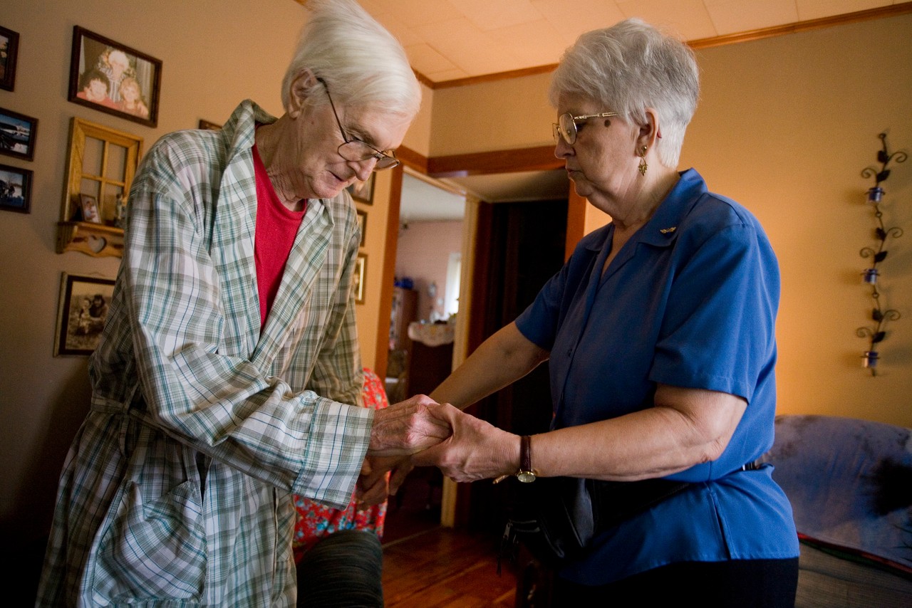 Ester Hinte, who has cancer,  helps her husband, Cliff, who is sick also.  They are parents of Sheryl Elkins.  The Elkins family of Oak Hill, West Virginia, have problems with health issues. Commission to Build a Healthier America - Elkins Family