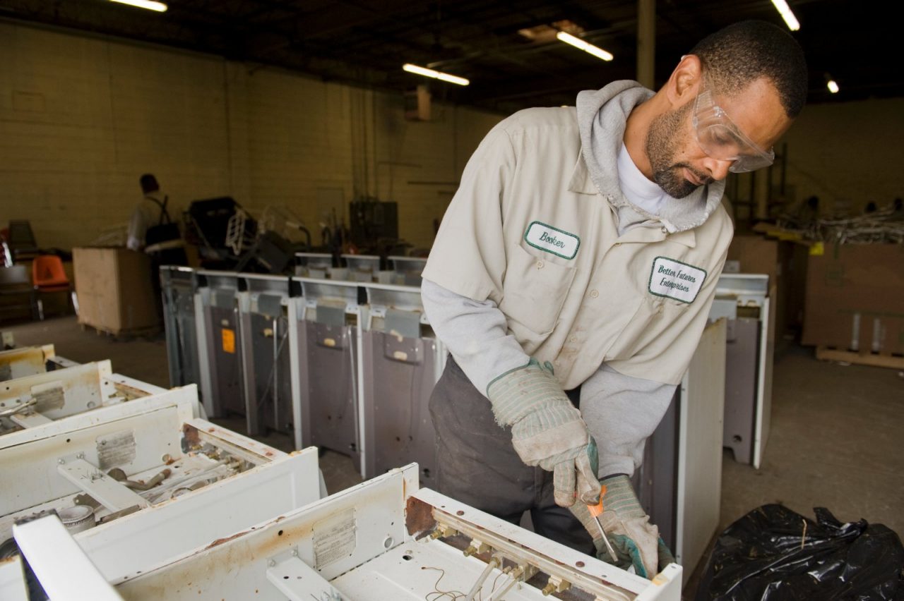 FOR RWJF "THE NETWORK FOR BETTER FUTURES" MINNEAPOLIS, MINNESOTA - MAY 13: Rodney Williams of The Network For Better Futures works at a processing and recycling facility in Minneapolis, MN May 13, 2010.