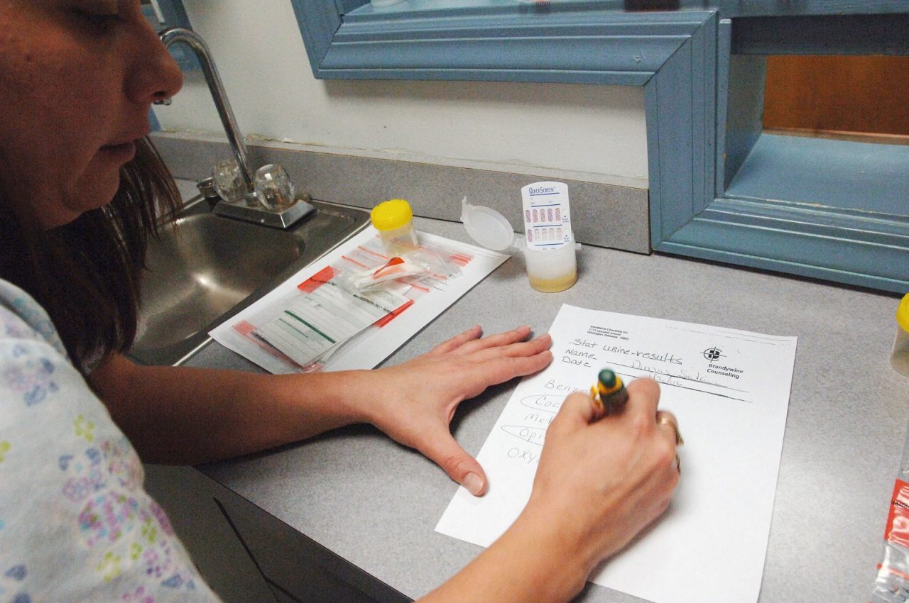 Tara Crowley records the drugs that show in a patient's urine at Brandywine Counseling Inc., a substance abuse treatment center in Wilmington, DE.  Paths to Recovery