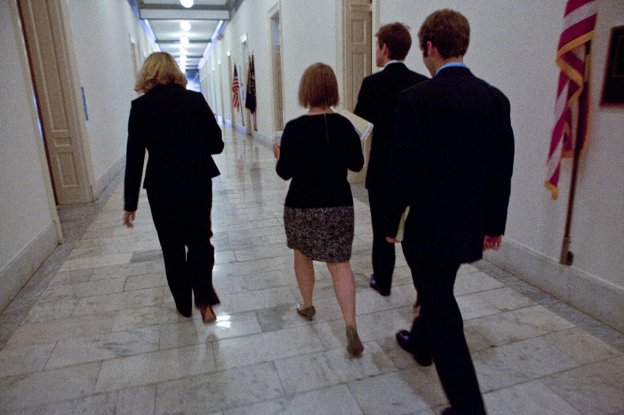 Legislative aids walking in a corridor in the Canon House Office Building, Washington, DC.