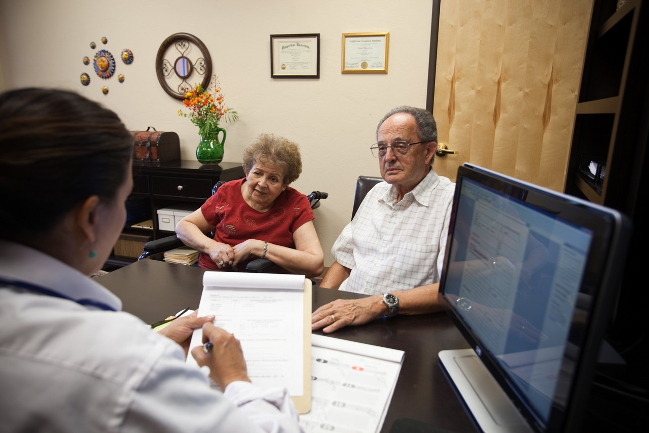 Roger Tully, Sr. and his wife Xenia Tully, stroke victim and early stages of dementia, at doctor's office in Marana, Arizona.
