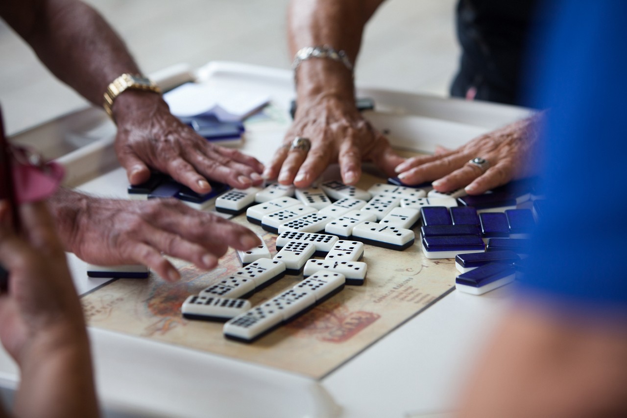 RWJF COH Miami, August 29-31, 2016. Neighborhood pictures in Little Havana area of Miami. People playing dominos in Domino Park. These are shot on "Calle Ocho" (8th Street), the main cultural area of Little Havana's Cuban culture. RWJF COH Miami, August 29-31, 2016. Neighborhood pictures in Little Havana area of Miami. People playing dominos in Domino Park. These are shot on "Calle Ocho" (8th Street), the main cultural area of Little Havana's Cuban culture.