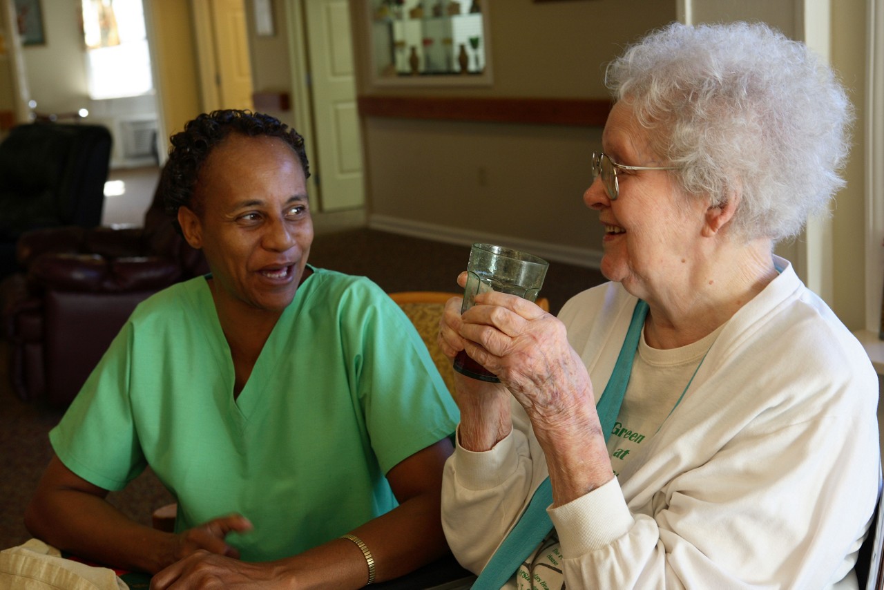 A nurses' aide and a resident of the Green House Project in Tupelo, MS.