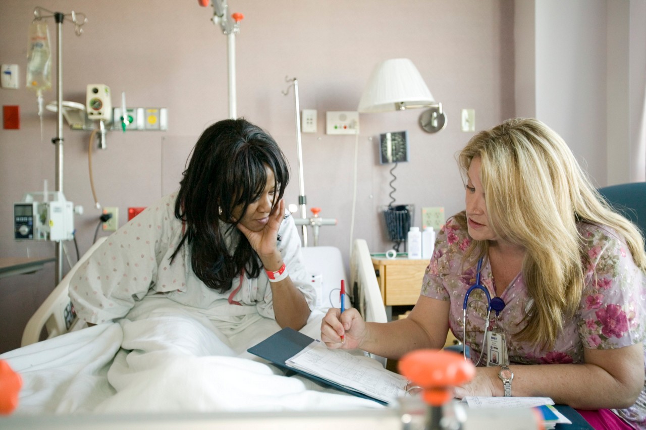 Mary Johnston, RN III, checking on patient Gloria Beatty in her room on the on the medical surgical floor of Seton Northwest Hospital, Austin, Texas. Transforming Care at the Bedside.