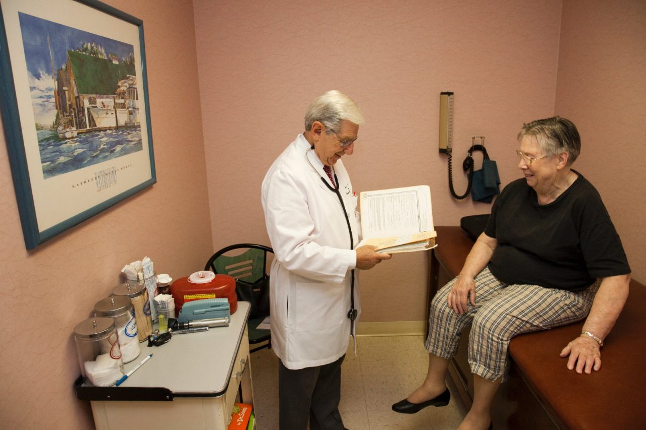 Dr. Leipsner gives a patient a checkup in the office of Dr. George Leipsner in Maywood, NJ.
