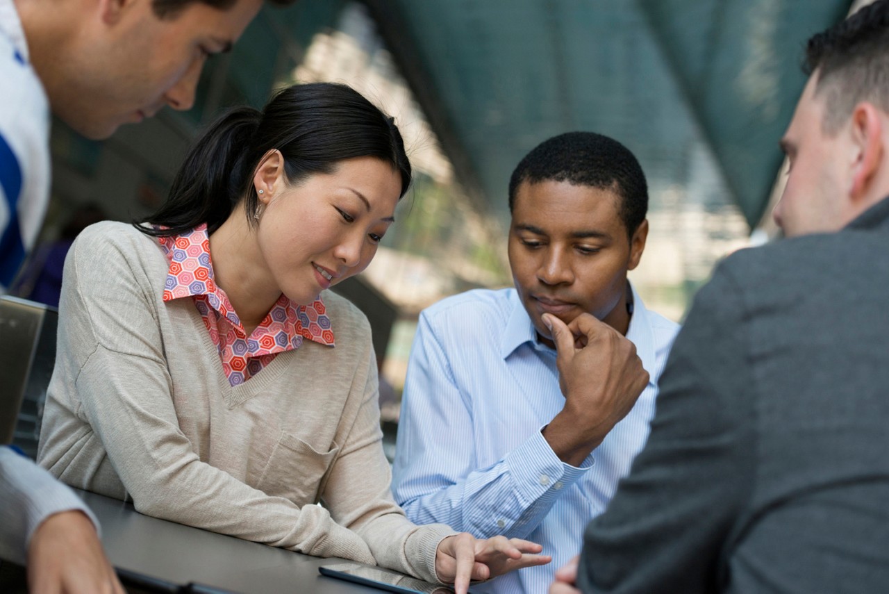 A group of young professionals working together.