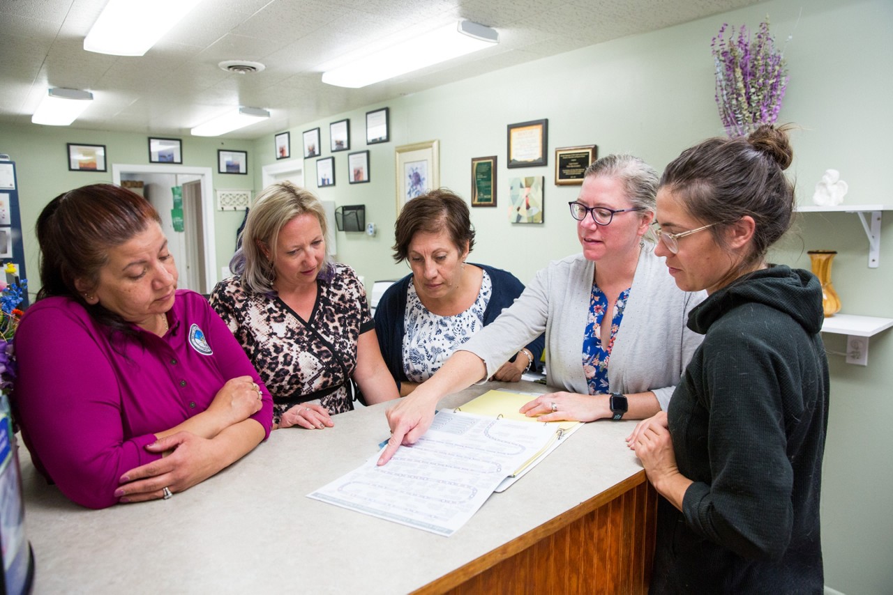 Colleen Nielson, Director of the Lake County Public Health Agency, holds a meeting with staff at their office in Leadville, Colorado.