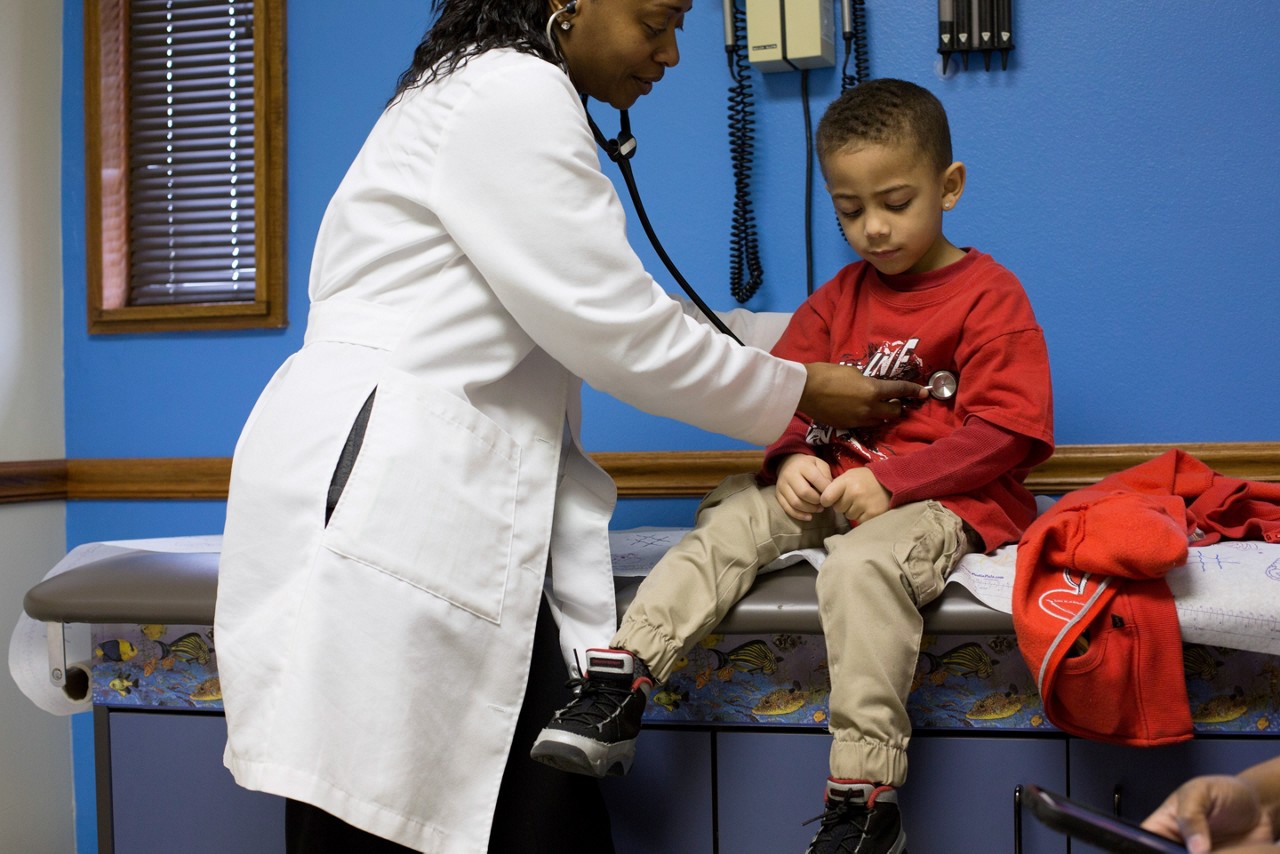 Dr. Amy Emerson reads books to kids visiting Dr. Runako Whittaker's Westview Clinic.
Tulsa, OK, (Photo by Samantha Appleton)