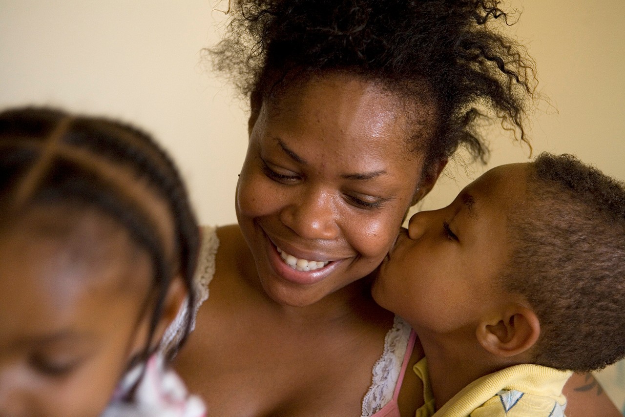 Beverly Davis, a single mother and her children, Alyla (daughter) and Semaj (son). Beverly suffers from Crohn's Disease.  Commission to Build a Healthier America - Beverly Davis. Long Beach, California.