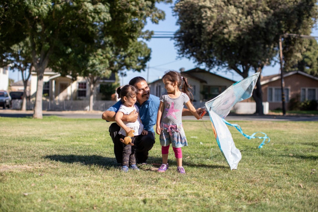 RWJF Culture of Health Prize 2019 - Gonzales, CA. Gilberto Arreloa (dad) with daughters Jaylah (4) and Christina Arreola (2).