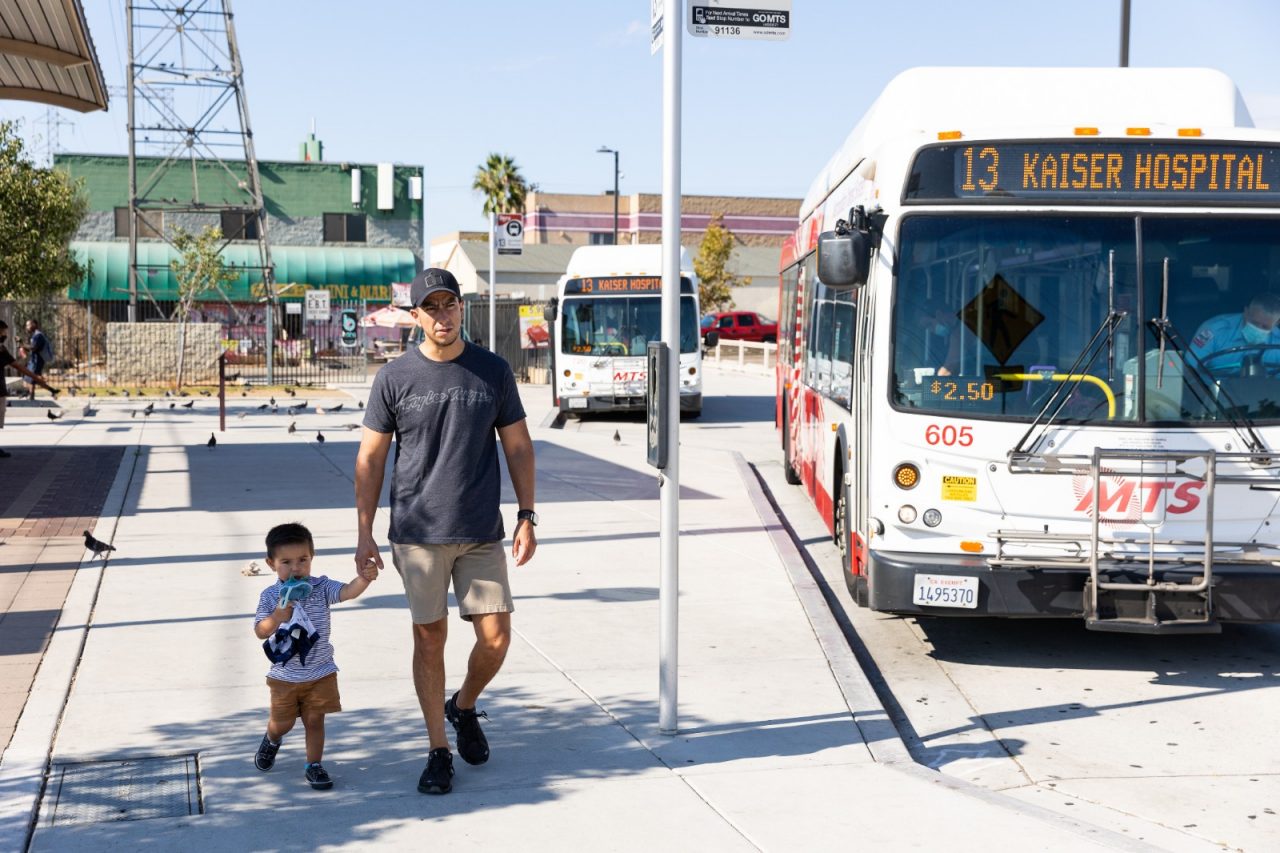 David Rodriguez takes his 2 year old son Oliver to the 24th Street Trolley and Transit Station in National City, California to look at the trolleys and buses pass by.