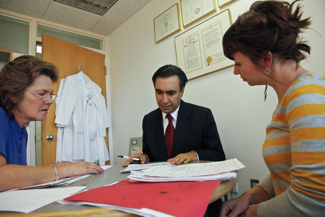 Dr. Sanjeev Arora, a liver disease expert; in staff meeting, University of New Mexico School of Medicine, Albuquerque, New Mexico. Project ECHO.