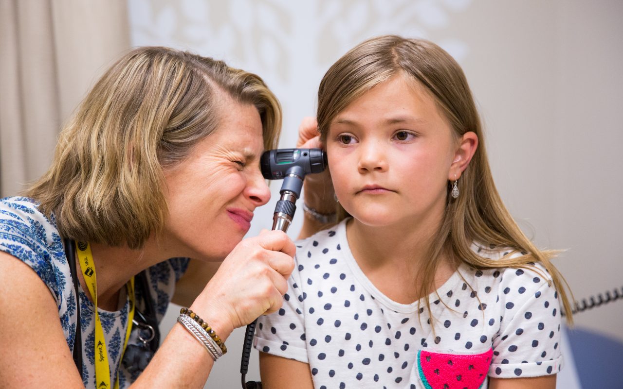 Nurse practitioner Jennifer Kagan examines 8 year old patient Ryden Hofer during a checkup at the School Based Health Center at Lake County High School in Leadville, Colorado. The School Based Health Center provides medical care and mental health services to students, teachers and families in the district.