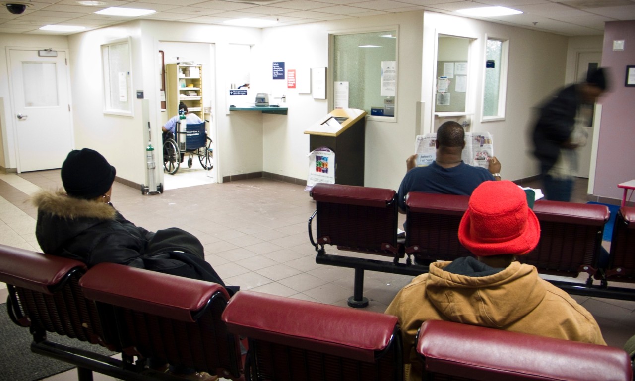 People sitting in a hospital waiting room.  Expecting Success